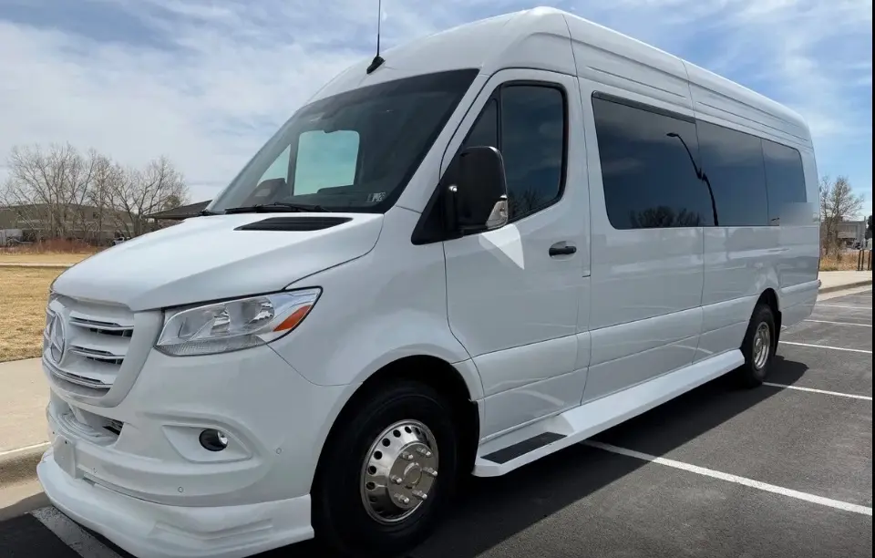 Greenwood Village 16 passenger white Sprinter limo bus